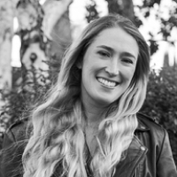 Black and white headshot of Ashlyn Watters