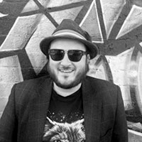 Black and white headshot of Glen Maddern