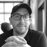 Black and white headshot of John Geyer